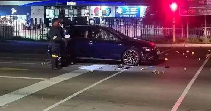 Bullet-riddled blue VW Polo belonging to DJ Sumbody, parked at the scene of his murder in 2022.