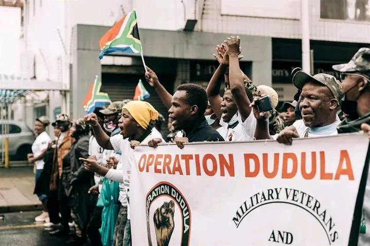 Protesters outside a South African hospital demanding that foreign nationals be denied access to public healthcare services
