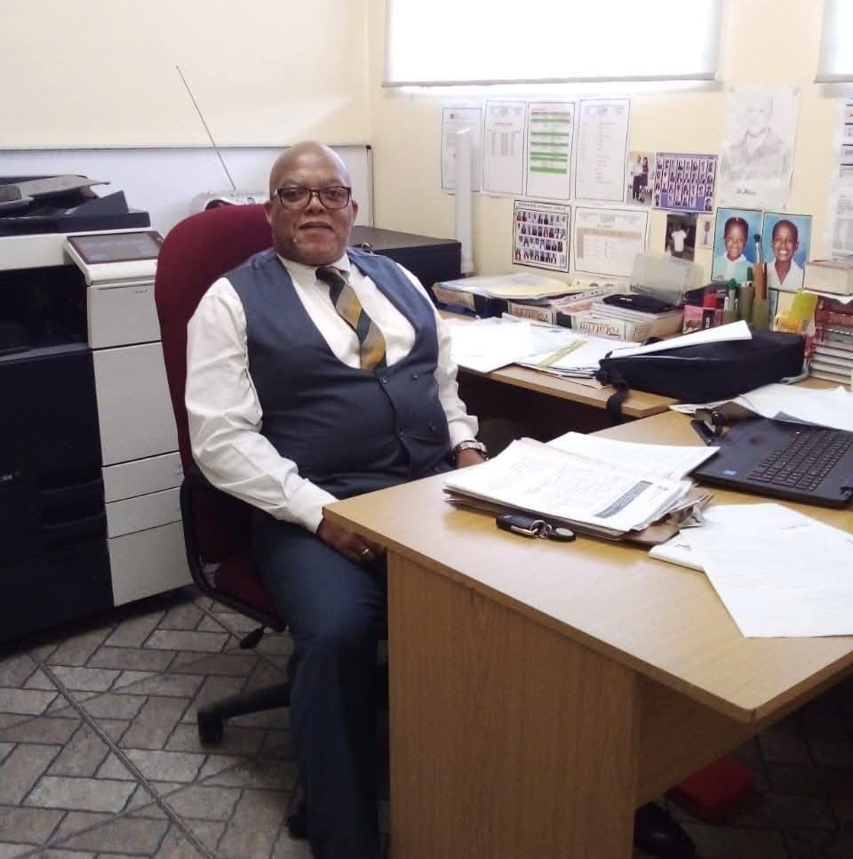 Principal Khayelihle Dhlomo seated in his office at Sithembile Primary School in Durban