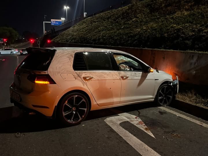 White Volkswagen riddled with bullet holes after police shootout with kidnapping kingpin Antonio Francisco Macamamo, known as “Dollarman.