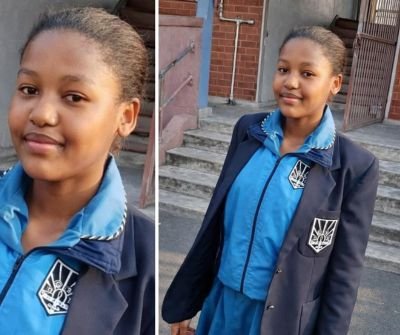Portrait of a Durban Girls Secondary School learner in school uniform, smiling in a school setting.
