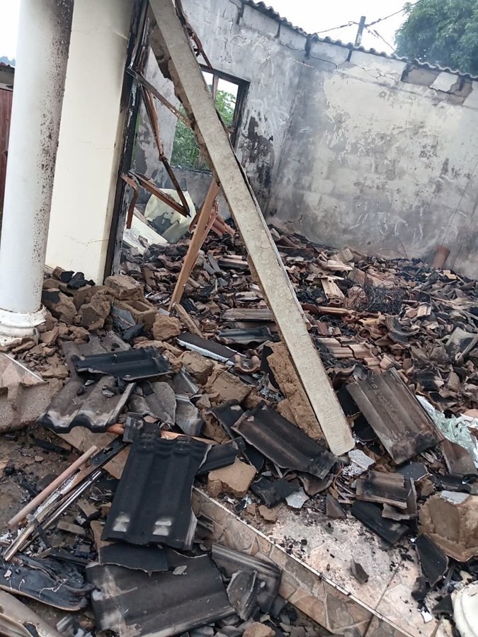 Interior of a burnt house in Ndwedwe after a fire destroyed the property and collapsed the roof.