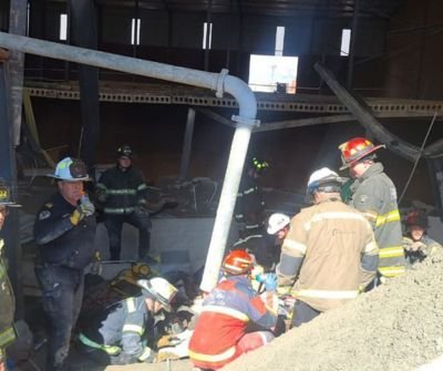 Emergency rescue teams search through rubble after the Ormonde building collapse in Johannesburg.
