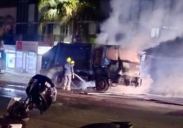 Tongaat Firefighters extinguishing burning Durban Solid Waste truck in Tongaat CBD